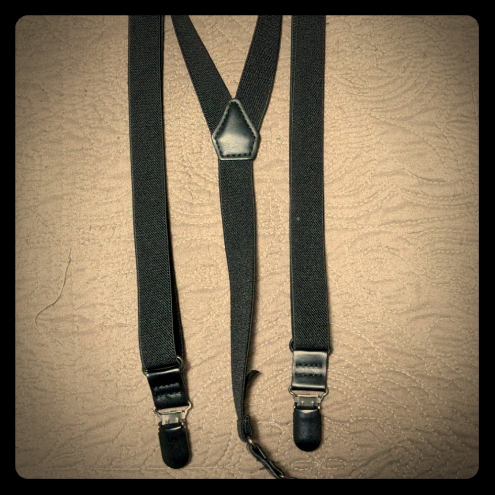Black suspenders, braces.